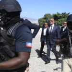 Haitian Prime Minister Ariel Henry leaves after attending a graduation ceremony for new members of the country's armed forces in Port-au-Prince, Haiti, Thursday, Dec. 22, 2022. (AP Photo/Odelyn Joseph)
