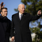 
              President Joe Biden and French President Emmanuel Macron stand on the stage during a State Arrival Ceremony on the South Lawn of the White House in Washington, Thursday, Dec. 1, 2022. (AP Photo/Andrew Harnik)
            
