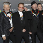 
              2022 Kennedy Center Honorees, from left, Adam Clayton, Bono, The Edge and Larry Mullen Jr. of U2 arrive at the Kennedy Center Honors on Sunday, Dec. 4, 2022, at The Kennedy Center in Washington. (Photo by Greg Allen/Invision/AP)
            