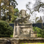 
              The historic statue of Charles Swanston, its head recently decapitated, stands in William Land Park on Tuesday, Dec. 27, 2022, in Sacramento, Calif. The statute of a 19th-century Northern California meat-packing magnate was beheaded earlier this week. (Hector Amezcua/The Sacramento Bee via AP)
            