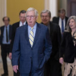 
              Senate Republican Leader Mitch McConnell, R-Ky., and his leadership team arrive to speak to reporters following a closed-door policy meeting, at the Capitol in Washington, Tuesday, Dec. 13, 2022. (AP Photo/J. Scott Applewhite)
            