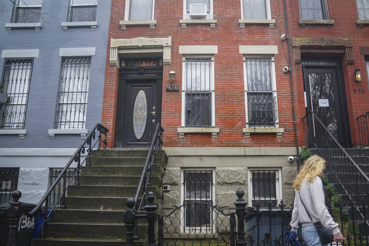 A building, center, owned by New York Mayor Eric Adams, located at 936 Lafayette Avenue in the Bedf...