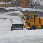 
              A snow removal truck clears snow off route 33 after a winter storm rolled through Western New York Tuesday, Dec. 27, 2022, in Buffalo, N.Y. (AP Photo/Jeffrey T. Barnes)
            