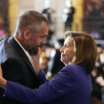 
              Speaker of the House Nancy Pelosi of Calif., embraces former Washington Metropolitan Police Department officer Michael Fanone before the start of a Congressional Gold Medal ceremony honoring law enforcement officers who defended the U.S. Capitol on Jan. 6, 2021, in the U.S. Capitol Rotunda in Washington, Tuesday, Dec. 6, 2022. (AP Photo/Alex Brandon)
            