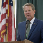 
              FILE - Georgia Gov. Brian Kemp speaks at Ola High School on July 29, 2022, in McDonough, Ga. Kemp on Thursday, Dec. 15, 2022, ordered all state agencies to ban TikTok, WeChat and Telegram from state-owned phones and computers, citing security threats. (AP Photo/Megan Varner, File)
            