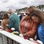 
              Space Shuttle Columbia team members remember the loss of the STS-107 crew during NASA's Day of Remembrance ceremony, presented by the Astronauts Memorial Foundation at Kennedy Space Center Visitor Complex in Florida, on Thursday, Jan. 26, 2023, for the 20th anniversary of the mission disaster that killed seven astronauts on Feb. 1, 2003. (Joe Burbank/Orlando Sentinel via AP)
            