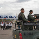 
              Venezuelan soldiers guard the Tienditas International Bridge in San Antonio, Tachira state, Venezuela, Sunday, Jan. 1, 2023. Colombia and Venezuela on Sunday opened the bridge that was finished in 2016 but never inaugurated because years of political tensions. (AP Photo/Ferley Ospina)
            