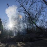 
              Ukrainian servicemen fire a 120 mm mortar towards Russian positions at the frontline near Bakhmut, Donetsk region, Ukraine, Wednesday, Jan. 11, 2023. (AP Photo/Evgeniy Maloletka)
            