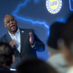 
              UAW President Ray Curry speaks during  a news conference on Friday, Jan. 20, 2023 in Flint.  General Motors says it will spend more than $900 million to update four factories, with the bulk going to an engine plant in Flint  to build the next-generation V8 for big pickup trucks and SUVs.(Jake May/The Flint Journal via AP)
            