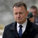 
              Poland's Defense Minister Mariusz Blaszczak is seen on his way to a press conference as part of the meeting of the 'Ukraine Defense Contact Group' at Ramstein Air Base in Ramstein, Germany, Friday, Jan. 20, 2023. Defense leaders are gathering at Ramstein Air Base in Germany Friday to hammer out future military aid to Ukraine, amid ongoing dissent over who will provide the battle tanks that Ukrainian leaders say they desperately need(AP Photo/Michael Probst)
            