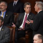 
              Rep. Kevin McCarthy, R-Calif., right, talks with Rep. Andy Ogles, R-Tenn., during the eighth round of voting in the House chamber as the House meets for the third day to elect a speaker and convene the 118th Congress in Washington, Thursday, Jan. 5, 2023. (AP Photo/Alex Brandon)
            