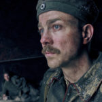 
              This image released by Netflix shows Albrecht Schuch in a scene from "All Quiet on the Western Front." (Netflix via AP)
            