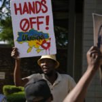 
              People supporting Ukraine picket against Russia's Foreign Minister Sergey Lavrov outside the Dirco (OR Tambo) Building in Pretoria, South Africa, Monday, Jan. 23, 2023. Lavrov arrived in South Africa for diplomatic talks with his counterpart amid heightened global tensions over the country's war with Ukraine. (AP Photo/Themba Hadebe)
            