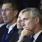 
              NATO Secretary General Jens Stoltenberg listens to Swedish Prime Minister Ulf Kristersson giving a speech during the annual Society and Defence Conference in Salen, Sweden, Sunday, Jan. 8, 2023. (Henrik Montgomery/TT News Agency via AP)
            