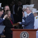
              Texas Lt. Gov. Dan Patrick, right, is sworn in by District Court Judge Ryan Patrick, left, on the steps of the Texas Capitol in Austin, Texas, Tuesday, Jan. 17, 2023. (AP Photo/Eric Gay)
            