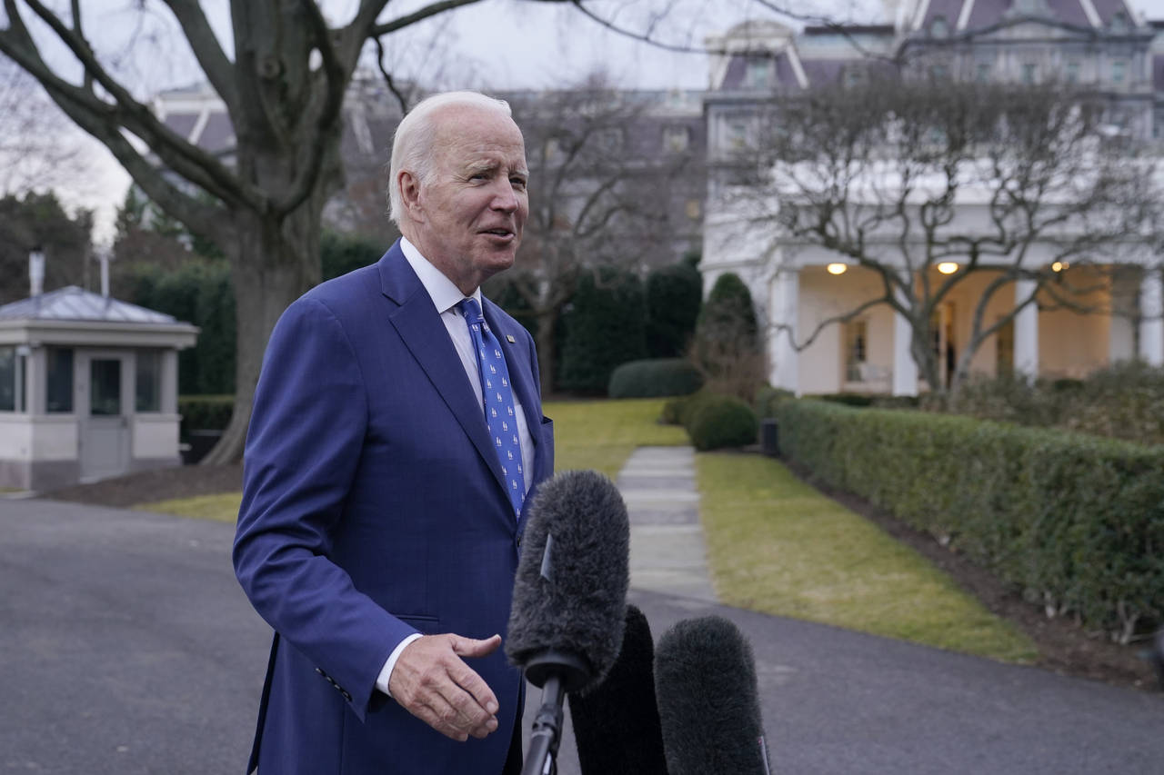 President Joe Biden talks with reporters outside White House in Washington, Wednesday, Jan. 4, 2023...