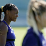 
              U.S. national team player Crystal Dunn listens to instructions with teammates during practice for a match against Nigeria Tuesday, Aug. 30, 2022, in Riverside, Mo. Women’s soccer in the United States has struggled with diversity, starting with a pay-to-play model that can exclude talented kids from communities of color. (AP Photo/Charlie Riedel)
            