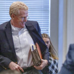 
              Former Hampton attorney Alex Murdaugh walks in the Colleton County Courthouse during the first day of jury selection in Walterboro, S.C. Monday, Jan. 23, 2023. (Grace Beahm Alford/The Post And Courier via AP, Pool)
            