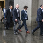 
              Cryptocurrency entrepreneur Sam Bankman-Fried, second from right, arrives for an appearance at Manhattan federal court Tuesday, Jan. 3, 2023, in New York.  Bankman-Fried will be arraigned in a Manhattan federal court Tuesday on charges that he cheated investors and looted customer deposits on his cryptocurrency trading platform. (AP Photo/Craig Ruttle)
            