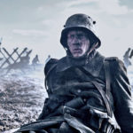 
              This image released by Netflix shows Felix Kammerer in a scene from "All Quiet on the Western Front." (Reiner Bajo/Netflix via AP)
            