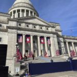 
              Workers set up the stage on the Arkansas state Capitol steps in Little Rock, Ark., on Monday, Jan. 9, 2023, for the inauguration ceremony of Sarah Huckabee Sanders. Sanders will be sworn in on Tuesday, Jan. 10, as Arkansas' 47th governor and the first woman to hold the post in her state. (AP Photo/Andrew DeMillo)
            