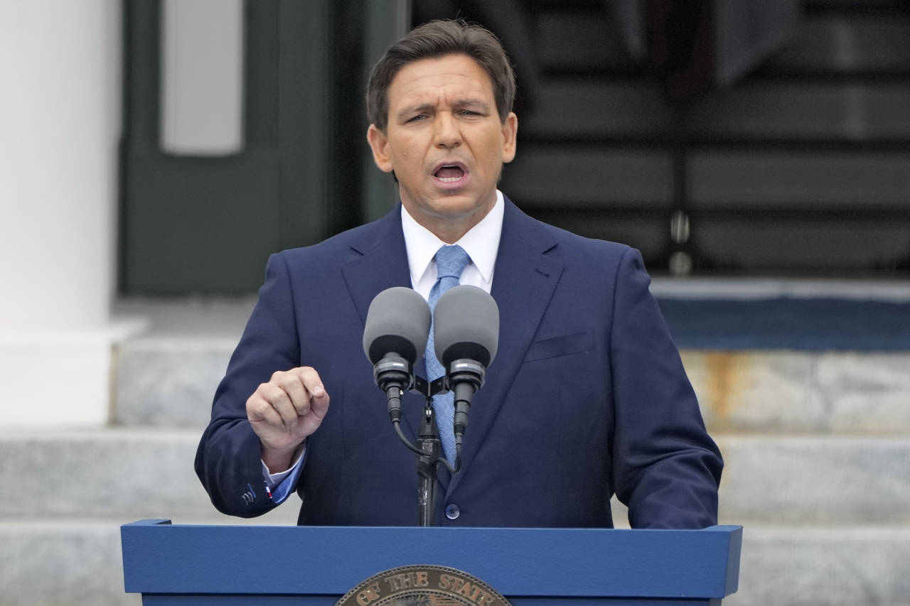 FILE - Florida Gov. Ron DeSantis speaks after being sworn in to begin his second term during an ina...