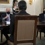 FILE - White House chief of staff Ron Klain, right, and Health and Human Services Secretary Xavier Becerra listen as President Joe Biden speaks about the southern border during a meeting in the State Dining Room of the White House, March 24, 2021, in Washington. Klain, who has spent more than two years as President Joe Biden's top aide, is preparing to exit his post in the coming weeks, according to a person familiar with Klain's plans. (AP Photo/Evan Vucci, File)