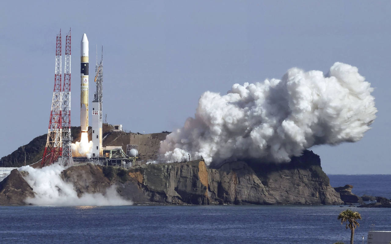 An H2A rocket lifts off from Tanegashima Space Center in Kagoshima, southern Japan Thursday, Jan. 2...