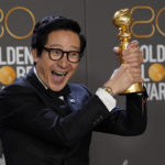
              Ke Huy Quan poses in the press room with the award for best performance by an actor in a supporting role in any motion picture for "Everything Everywhere All at Once" at the 80th annual Golden Globe Awards at the Beverly Hilton Hotel on Tuesday, Jan. 10, 2023, in Beverly Hills, Calif. (Photo by Chris Pizzello/Invision/AP)
            