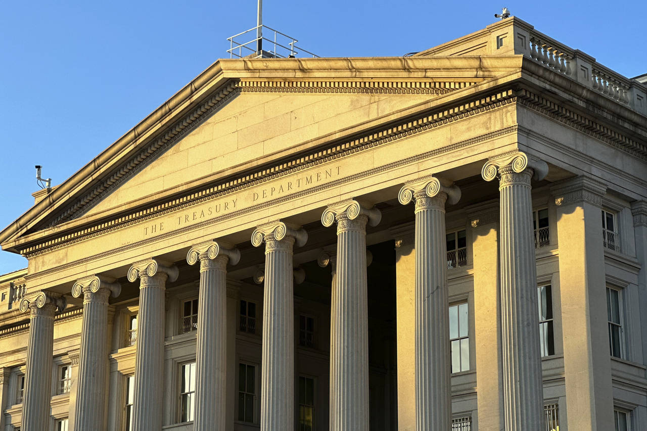 The Treasury Department is seen near sunset in Washington, Wednesday, Jan. 18, 2023. The Treasury D...