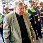 
              FILE - Cardinal George Pell arrives for a hearing at an Australian court in Melbourne, Australia, March 5, 2018. Pell, who was the most senior Catholic cleric to be convicted of child sex abuse before his convictions were later overturned, has died Tuesday, Jan. 10, 2023, in Rome at age 81. (AP Photo/Asanka Brendon Ratnayake, File)
            
