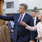 Croatia's Prime Minister Andrej Plenkovic welcomes Ursula von der Leyen, President of the European Commission in Zagreb, Croatia, Sunday, Jan. 1, 2023. Croatia switched to the shared European currency, the euro, and removed dozens of border checkpoints to join the world's largest passport-free travel area. (AP Photo/Darko Bandic)
