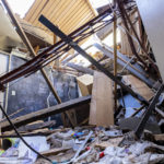 
              A heavily-damaged classroom in the preschool building at Crosspoint Christian Church is seen, Sunday, Jan. 15, 2023, in Selma, Ala. A tornado destroyed most of the building several days earlier, with dozens of children and several teachers inside. All reached interior bathrooms or staff rooms and survived. (AP Photo/Vasha Hunt)
            