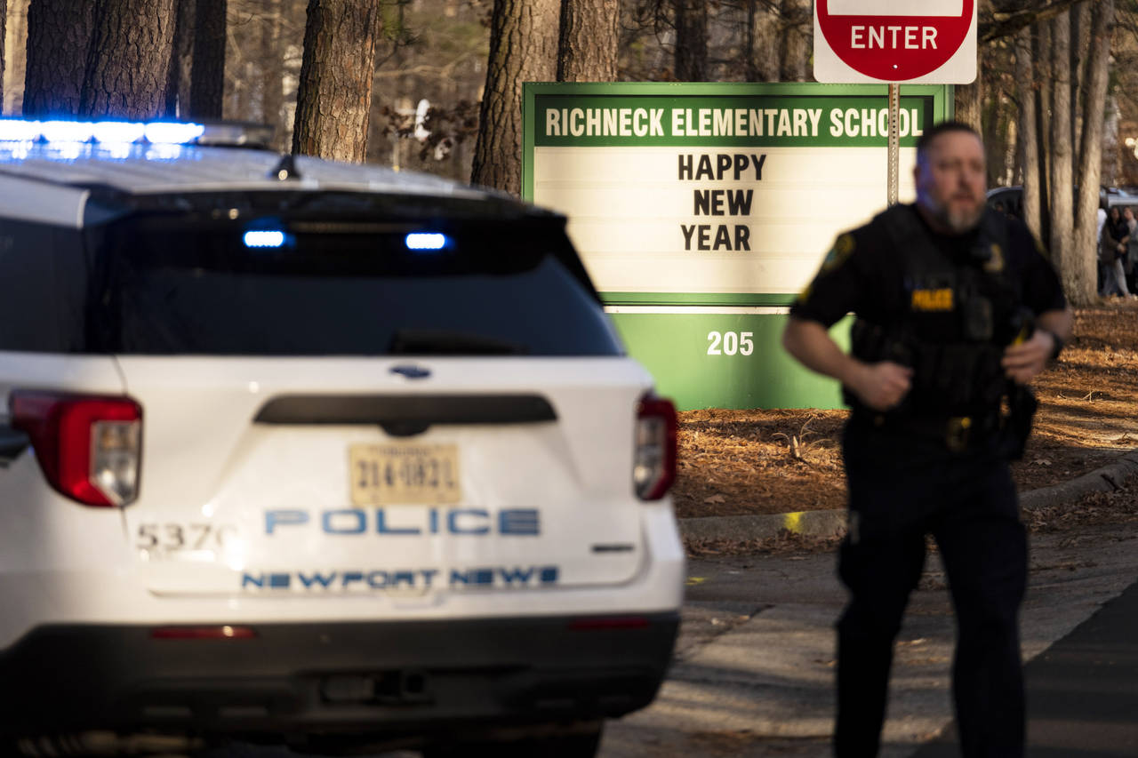 Police respond to a shooting at Richneck Elementary School, Friday, Jan. 6, 2023 in Newport News, V...