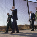 
              FILE - President Joe Biden walks along a stretch of the U.S.-Mexico border in El Paso Texas, Jan. 8, 2023. (AP Photo/Andrew Harnik, File)
            