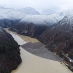 
              Aerial view of waste floating in the Drina river near Visegrad, Bosnia, Friday, Jan. 20, 2023. Tons of waste dumped in poorly regulated riverside landfills or directly into the rivers across three Western Balkan countries end up accumulating during high water season in winter and spring, behind a trash barrier in the Drina River in eastern Bosnia. (AP Photo/Armin Durgut)
            
