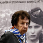 
              Holocaust survivor Barbara Doniecka attends a meeting of survivors with media in Oswiecim, Poland, Thursday, Jan. 26, 2023. Survivors of Auschwitz-Birkenau are gathering to commemorate the 78th anniversary of the liberation of the Nazi German death camp in the final months of World War II, amid horror that yet another war has shattered the peace in Europe. The camp was liberated by Soviet troops on Jan. 27, 1945. (AP Photo/Michal Dyjuk)
            