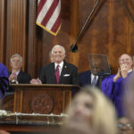 
              Gov. Henry McMaster smiles as members rise to applaud after he introduced Lt. Gov. Pamela Evette at the beginning of his State of the State address on Wednesday, Jan. 25, 2023, in Columbia, S.C. (AP Photo/Meg Kinnard)
            