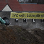 
              A  protester sits on a chair in Luetzerath, Germany, Sunday, Jan.8, 2023 Luetzerath is to be mined for the expansion of the Garzweiler II opencast lignite mine. (Henning Kaiser/dpa via AP)
            