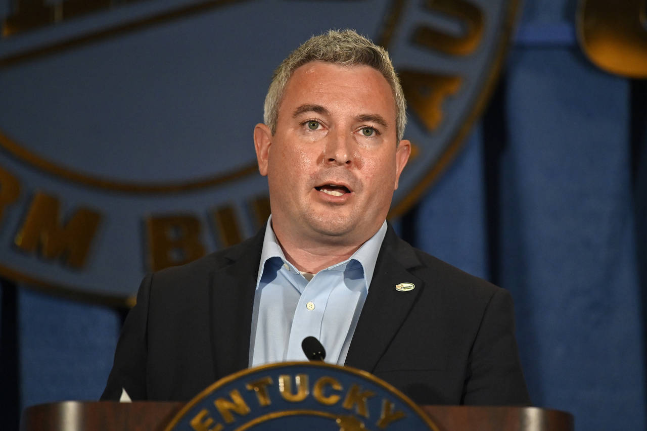 FILE - Kentucky Agricultural Commissioner Ryan Quarles addresses the audience at the Kentucky Farm ...