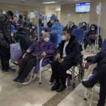 
              Patients receive intravenous drips in an emergency ward in Beijing, Thursday, Jan. 19, 2023. China on Thursday accused "some Western media" of bias, smears and political manipulation in their coverage of China's abrupt ending of its strict "zero-COVID" policy, as it issued a vigorous defense of actions taken to prepare for the change of strategy. (AP Photo/Andy Wong)
            