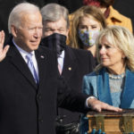
              FILE - Joe Biden is sworn in as the 46th president of the United States by Chief Justice John Roberts as Jill Biden holds the Bible during the 59th Presidential Inauguration at the U.S. Capitol in Washington, Jan. 20, 2021. (AP Photo/Andrew Harnik, File)
            