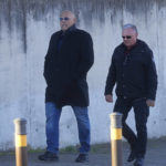 
              Leader of a Hells Angels gang, German national Frank Hanebuth, left, arrives at the National Court in San Fernando de Henares, just outside Madrid, Spain, Monday, Jan. 23, 2023. A European leader of the Hells Angels goes on trial in Madrid for running a chapter of the criminal biker gang on the Spanish holiday island of Mallorca. Prosecutors are seeking a 13-year sentence for German national Frank Hanebuth on charges that include running a criminal organization, money laundering and illegal possession of firearms. He is being tried alongside 46 collaborators from Luxembourg, Turkey and the United Kingdom, the most senior of whom face up to 24 years in jail. (AP Photo/Paul White)
            