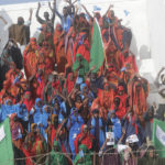 Residents and officials lead a demonstration supporting the government at Banadir stadium, Mogadishu, Thursday Jan. 12, 2023. The government rally encouraged an uprising against the al-Shabab group amid a month long military offensive. (AP Photo/Farah Abdi Warsameh)
