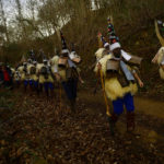 
              Men dressed in sheepskins and jingling bells to make noise, march during the traditional ancient festival "La Vijanera" in the town of Silio, northern Spain, Saturday, Jan. 7, 2023. (AP Photo/Alvaro Barrientos)
            