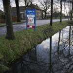 
              A sign indicates the village limits in Ommeren, near Arnhem, Netherlands, Thursday, Jan. 19, 2023. A hand-drawn map with a red letter X purportedly showing the location of a buried stash of precious jewellery looted by Nazis from a blown-up bank vault has sparked a modern-day treasure hunt in a tiny Dutch village. (AP Photo/Peter Dejong)
            