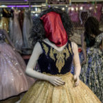 
              A mannequin's head is covered in a woman dress shop in Kabul, Afghanistan, Monday, Dec. 26, 2022. Under the Taliban, the mannequins in women's dress shops across the Afghan capital Kabul are a haunting sight, their heads cloaked in cloth sacks or wrapped in black plastic bags. The hooded mannequins are one symbol of the Taliban's puritanical rule over Afghanistan (AP Photo/Ebrahim Noroozi)
            