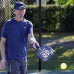
              Owen Glick plays pickle ball at Phelps Park, Tuesday, Jan. 17, 2023, in Winter Park, Fla. Glick was among the 233,000 people who left a Western state for another U.S. state out of the region. The U.S. population center is on track this decade to take a southern swerve for the first time in history, and it's because of people like Glick, who moved from California to Florida more than a year ago. (AP Photo/John Raoux)
            