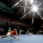 
              Serbia's Novak Djokovic stretches during his semifinal match against Russia's Daniil Medvedev at the Adelaide International Tennis tournament in Adelaide, Australia, Saturday, Jan. 7, 2023. (AP Photo/Kelly Barnes)
            