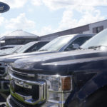 
              Ford F150 trucks are displayed at a Gus Machado dealership Monday, Jan. 23, 2023, in Hialeah, Fla. On Thursday, the Commerce Department issues its first of three estimates of how the U.S. economy performed in the fourth quarter of 2022.(AP Photo/Marta Lavandier)
            